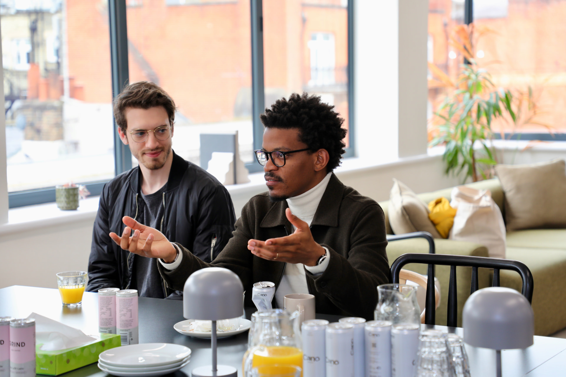 Two founders in conversation during a session